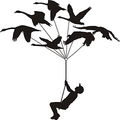 Image showing Flying swans with boys