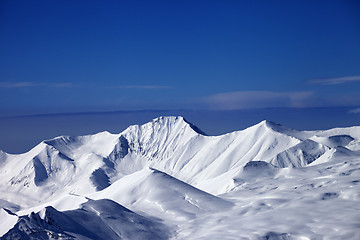 Image showing Snow plateau and blue sky