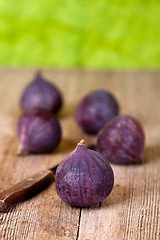 Image showing fresh figs and old knife