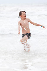 Image showing young little boy in water summer holiday fun sea 