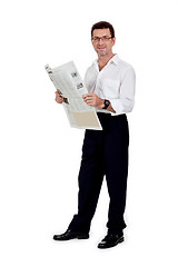 Image showing attractive adult businessman reading newspaper isolated