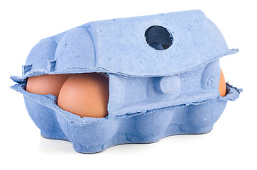 Image showing Closed box with six brown eggs