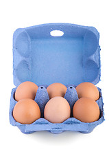 Image showing Box with six brown eggs