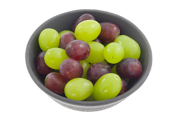 Image showing Bowl of red and green grapes

