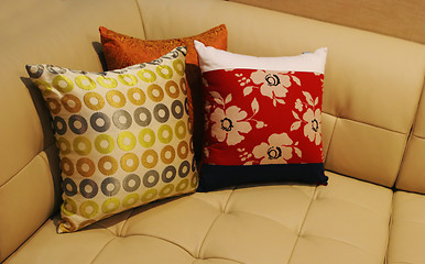 Image showing Pillows on a leather sofa