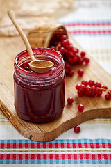 Image showing jar of redcurrant berry jam 