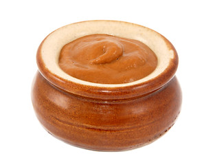 Image showing French mustard served in a small ceramic pot