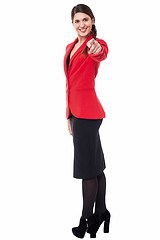 Image showing Stylish corporate woman pointing at you