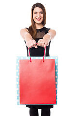 Image showing Shopaholic girl holdng shopping bags