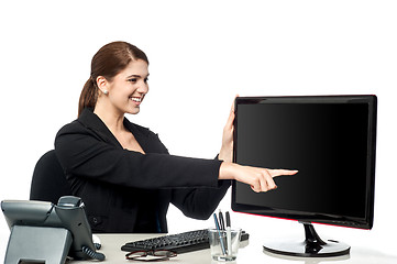 Image showing Lady pointing on blank computer screen