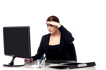 Image showing Female secretary focusing on work