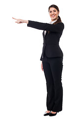 Image showing Businesswoman pointing away