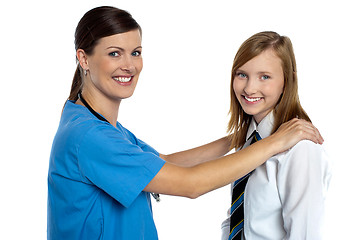 Image showing Friendly female doctor with her patient