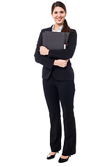 Image showing Pretty secretary holding business files