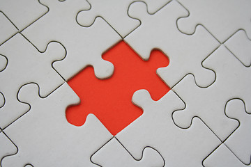 Image showing Orange jigsaw piece
