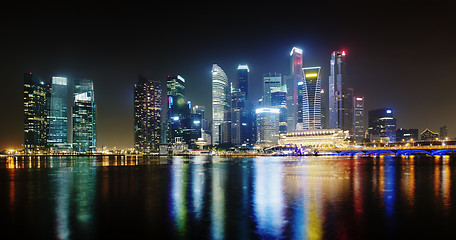Image showing Night Singapore skyscrapers shines with lights