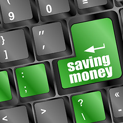 Image showing saving money button on computer keyboard key