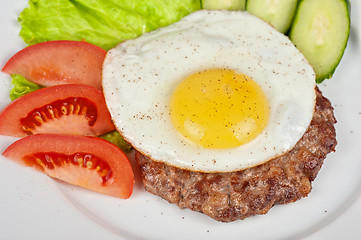 Image showing steak beef meat with fried egg