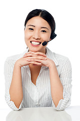 Image showing Cute asian female as help desk operator