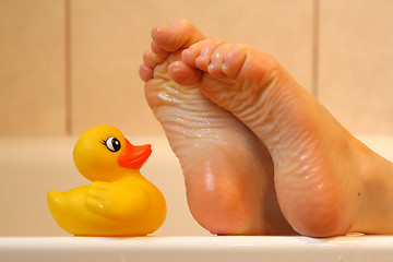 Image showing Feet taking with bath duck