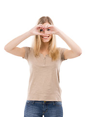 Image showing Woman doing a heart with her hands