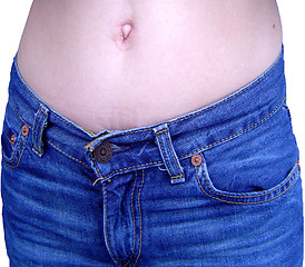 Image showing Belly Button and blue jeans