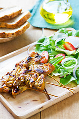 Image showing Grilled chicken skewer with salad