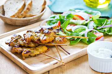 Image showing Grilled chicken skewer with salad