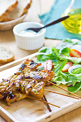 Image showing Grilled chicken skewer with salad