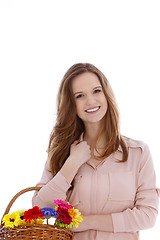 Image showing Beautiful teenage girl with fresh flowers