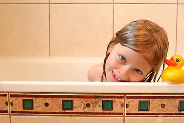 Image showing Portrait with bath duck