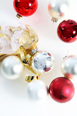 Image showing Red and white Christmas baubles