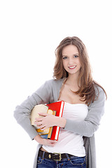 Image showing Attractive student carrying her books