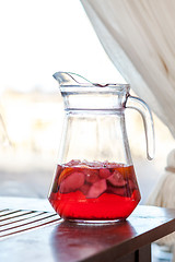 Image showing jug of fresh red fruit drink