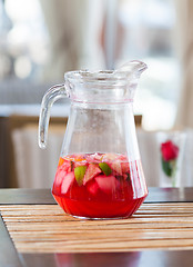 Image showing jug of fresh red fruit drink