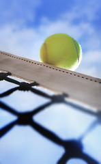 Image showing Tennis ball on net´s edge