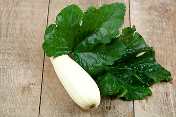 Image showing fresh zucchini with green leaves