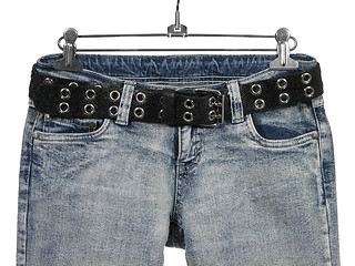 Image showing Blue jeans with black leather belt