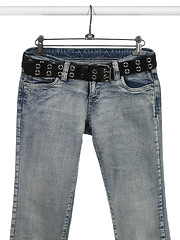 Image showing Blue jeans, black leather belt