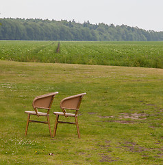 Image showing Two chairs on a row