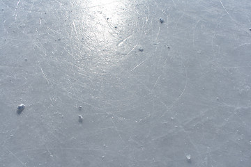 Image showing Sun reflecting in the surface of an ice rink