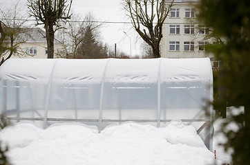 Image showing polythene conservatory snow town yard season 