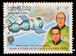 Image showing Stamp printed in Laos shows Soyuz 19 and crew A. Leonov and V. Kubasov