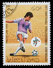 Image showing Stamp printed in LAOS shows the football Players