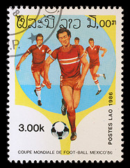 Image showing Stamp printed in LAOS shows the football Players