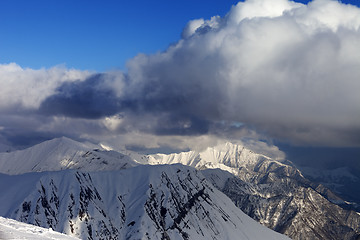 Image showing Snow mountains and blue sky with clouds