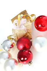 Image showing Christmas gift with baubles