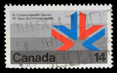 Image showing Stamp printed in Canada shows a symbol of XI Commonwealth Games