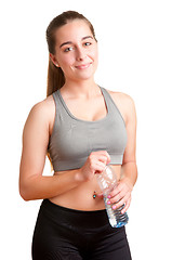 Image showing Woman Holding Bottle of Water