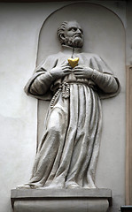 Image showing Saint on facade, House of the Golden Well, Prague,